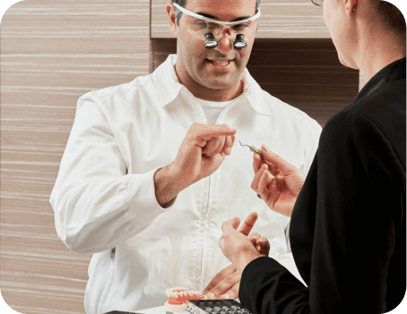 Dentist providing expert emergency dental care